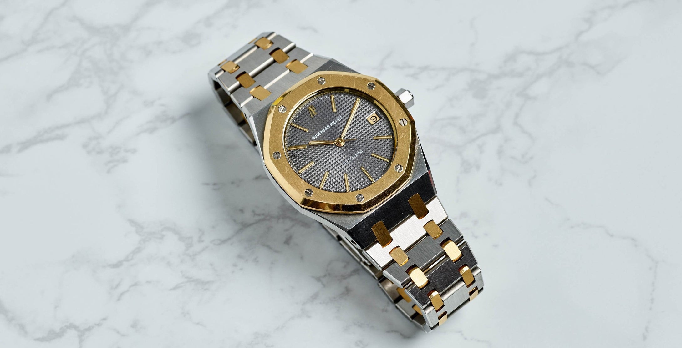 Audemars Piguet Steel and Gold Royal Oak Grey Waffle Vintage Watch | Veralet