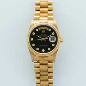 Rolex 18K Yellow Gold Oyster Perpetual Day-Date President Watch with Onyx Serti Dial and Box and Papers | Veralet