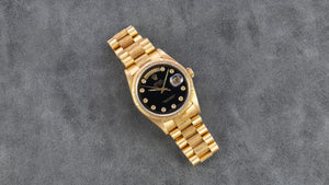 Rolex 18K Yellow Gold Oyster Perpetual Day-Date President Watch with Onyx Serti Dial and Box and Papers | Veralet