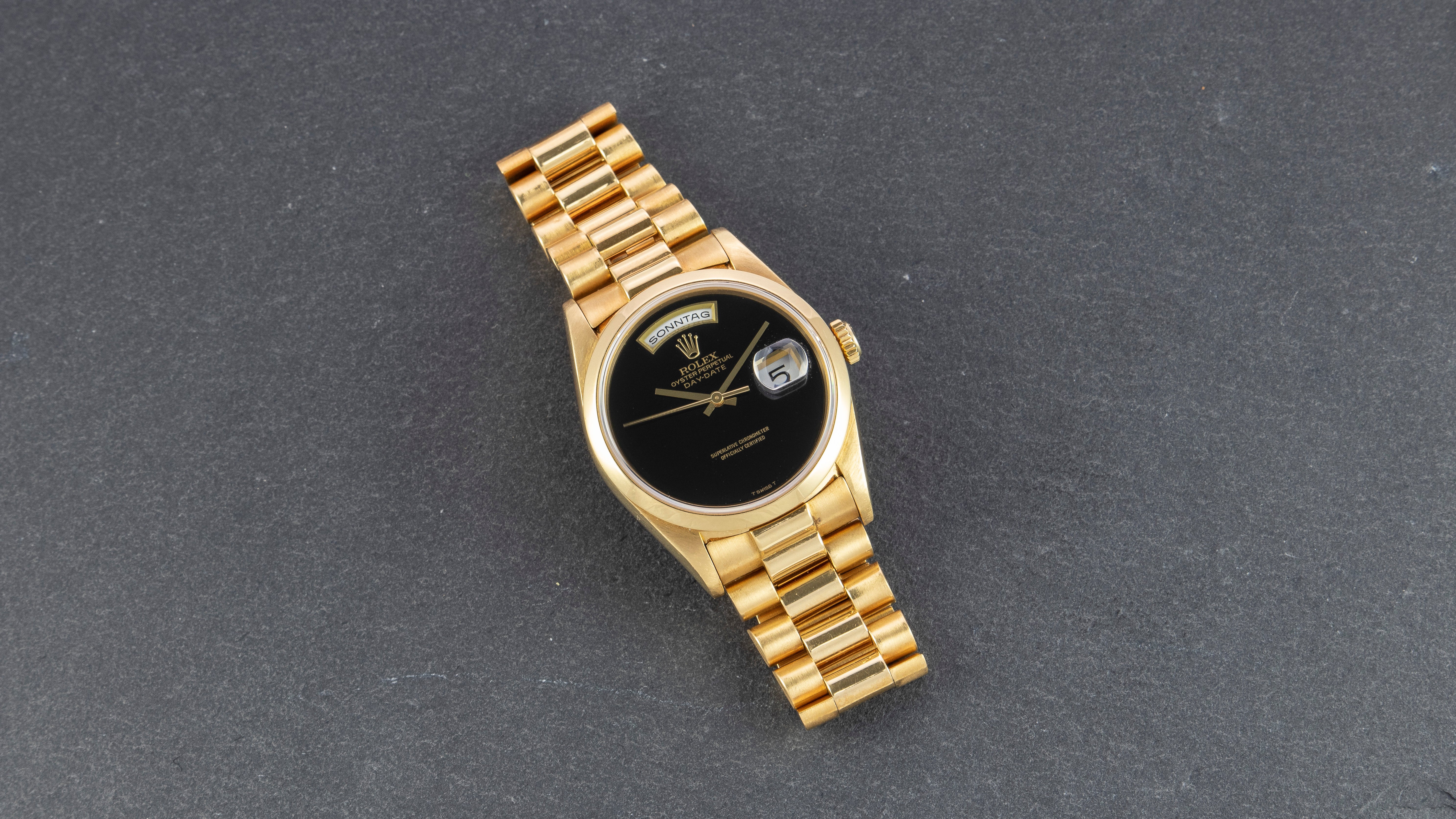 Rolex 18K Yellow Gold Oyster Perpetual Day-Date President Watch with Black Onyx Dial | Veralet