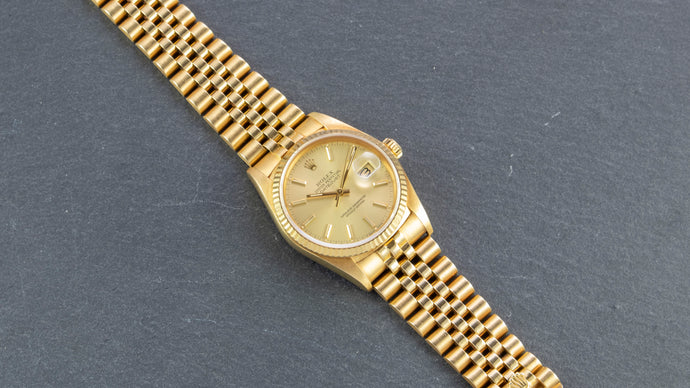 Rolex 18K Yellow Gold Oyster Perpetual Champagne Dial Datejust Watch | Veralet